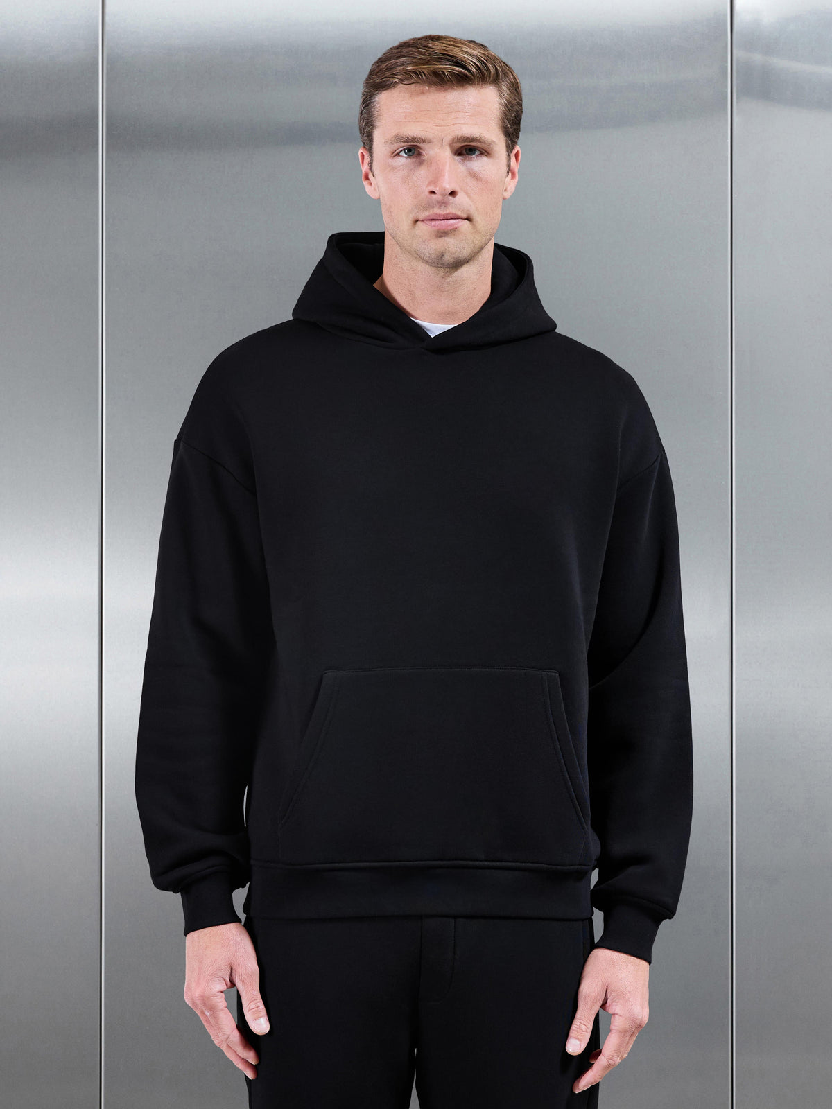 Essential Relaxed Hoodie in Black